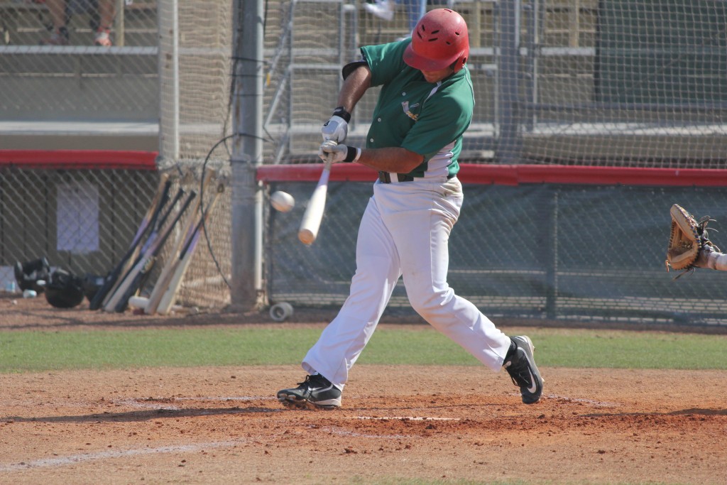 Thomas Roulis rips a double in 9-6 win over Grizzly. Photo by Steve Sitter.